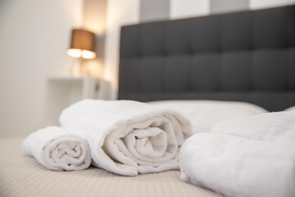Postel nebo postele na pokoji v ubytování b&b Zio Luciano