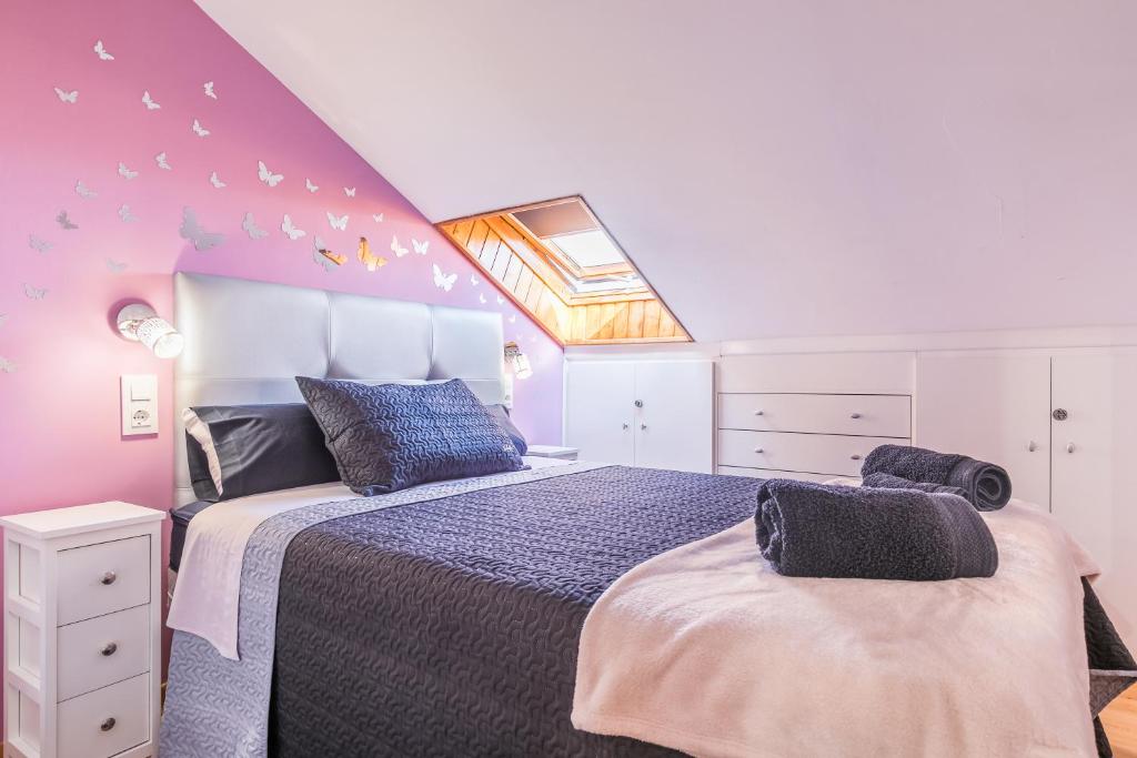 Posteľ alebo postele v izbe v ubytovaní APARTAMENTOS TURISTICOS TURISToledo