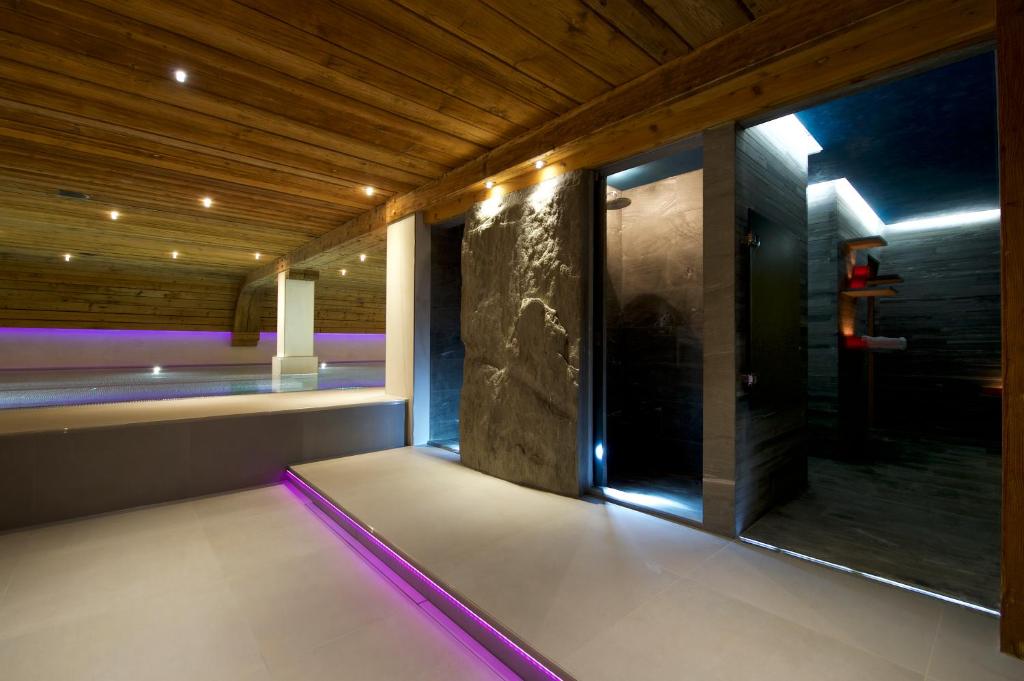 Cama o camas de una habitación en Naco Aparthotel by Arca Spa