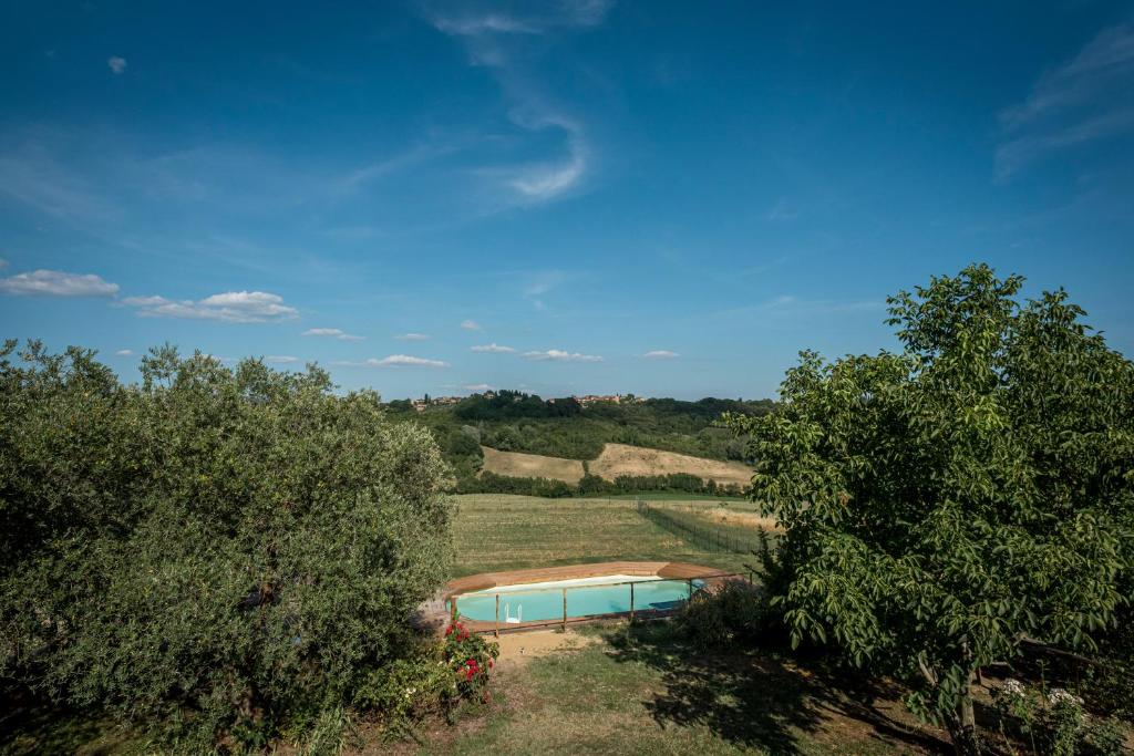 Bazén v ubytování Agriturismo Le Tre Pietre - Podere nel Chianti nebo v jeho okolí