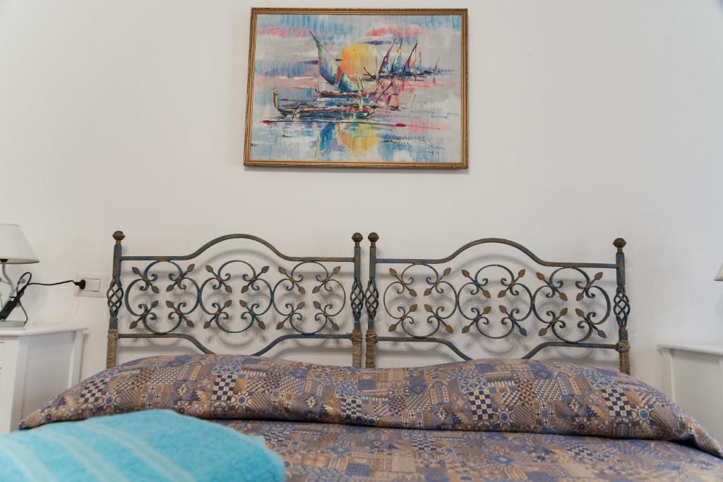 Posteľ alebo postele v izbe v ubytovaní Casa degli Artisti Diamante