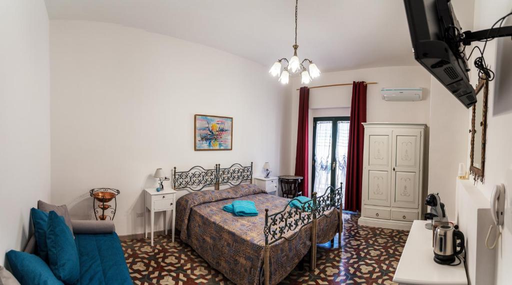 Posteľ alebo postele v izbe v ubytovaní Casa degli Artisti Diamante