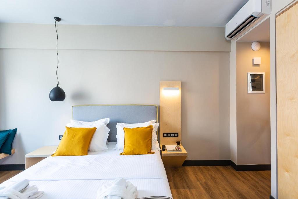 Posteľ alebo postele v izbe v ubytovaní St. Bjur Suites