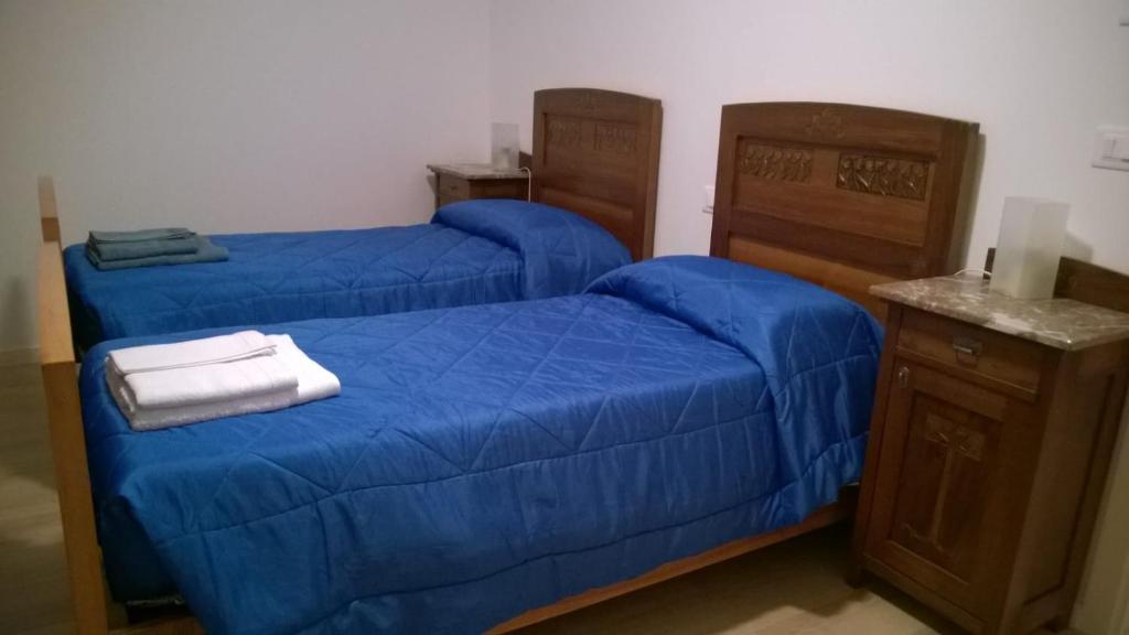 Postel nebo postele na pokoji v ubytování Sot la Mont
