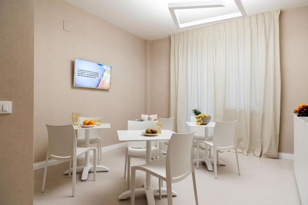 TV a/nebo společenská místnost v ubytování B&B Blanc