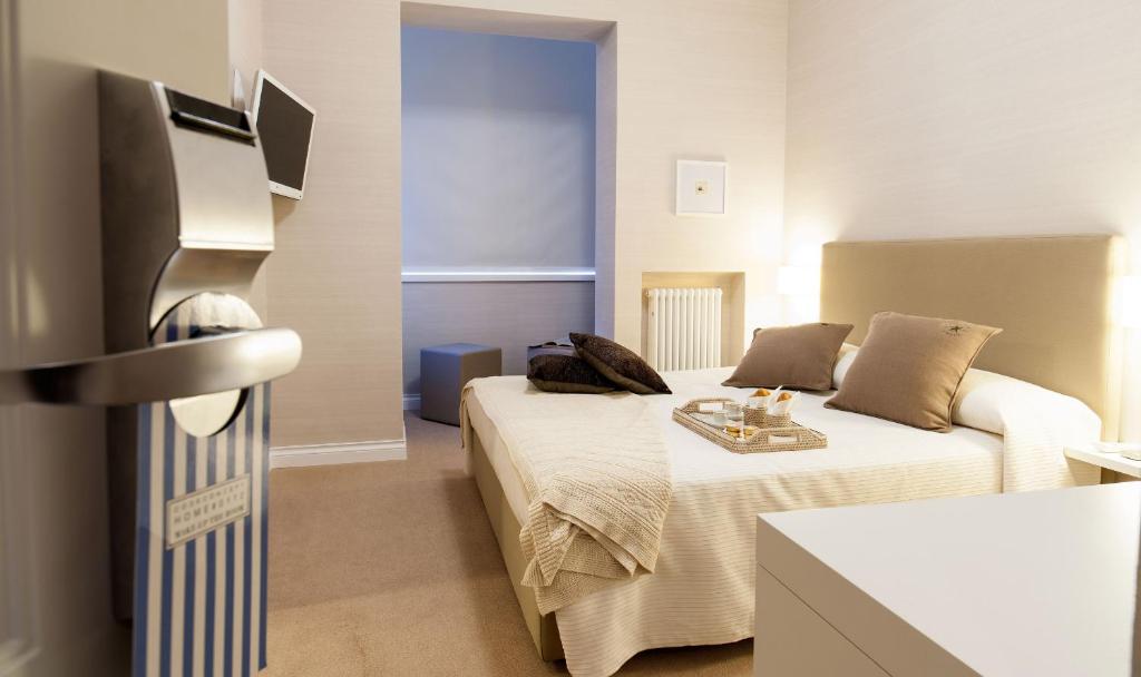Postel nebo postele na pokoji v ubytování B&B Blanc