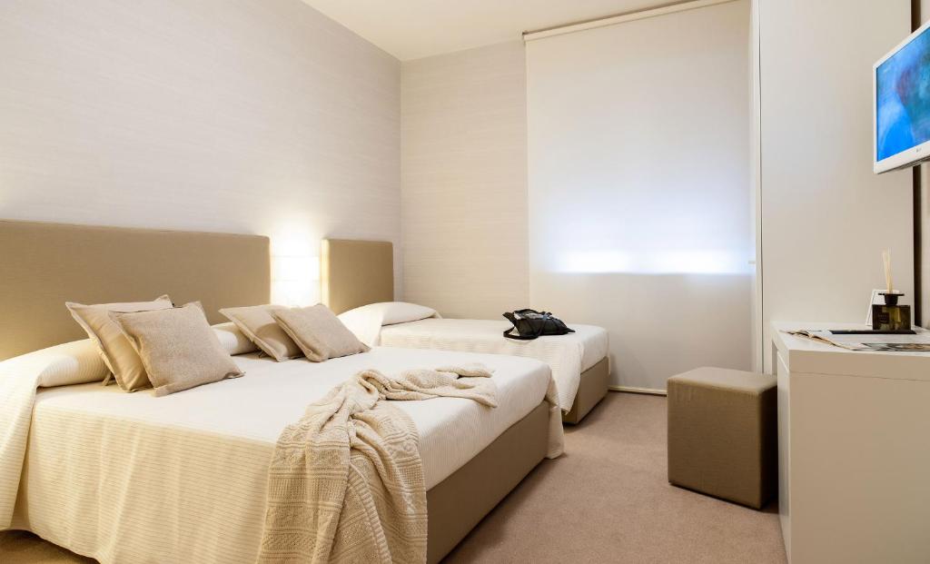 Postel nebo postele na pokoji v ubytování B&B Blanc