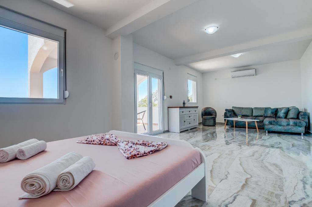 Voodi või voodid majutusasutuse Dolaca Villas toas