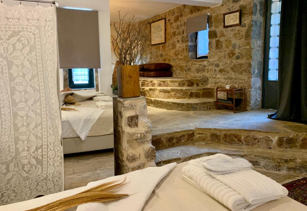 Posteľ alebo postele v izbe v ubytovaní Villa Vager Mani Hotel