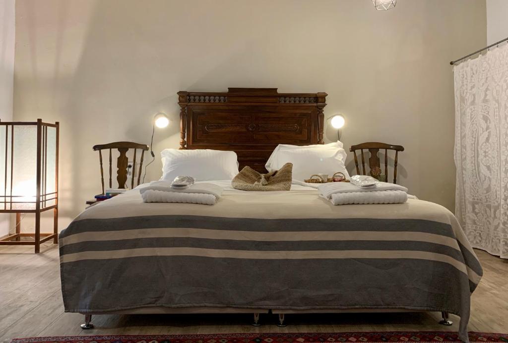 Posteľ alebo postele v izbe v ubytovaní Villa Vager Mani Hotel