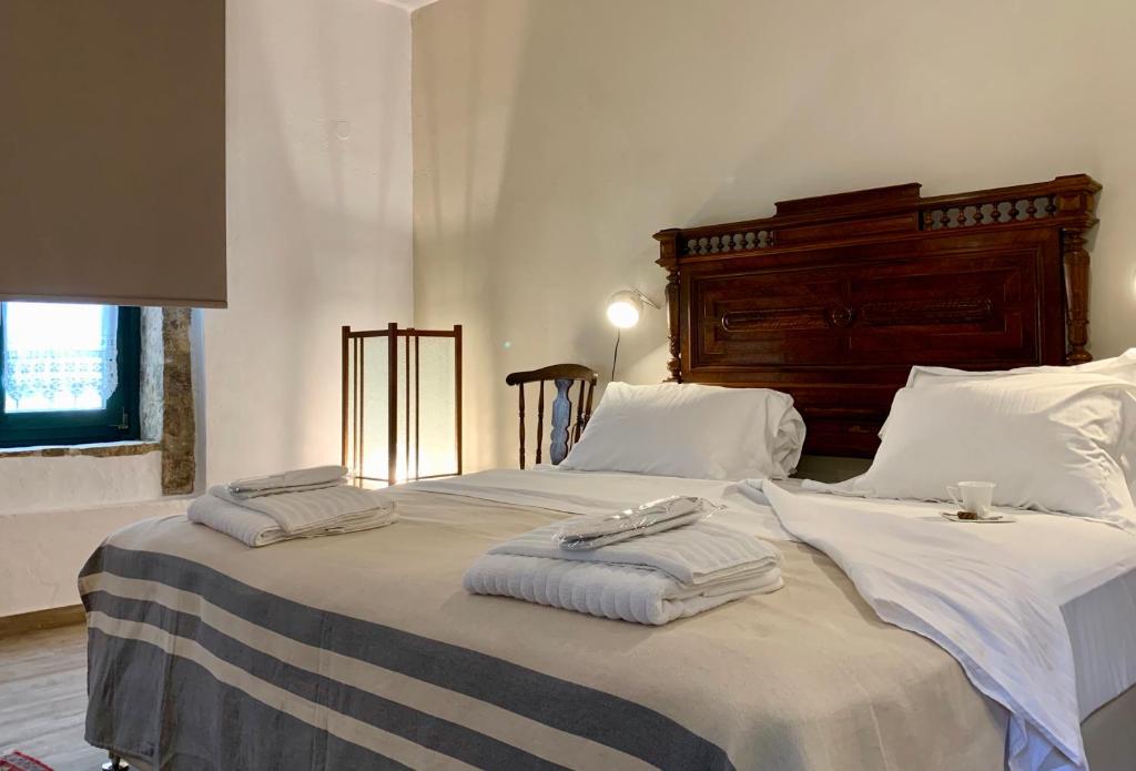 Posteľ alebo postele v izbe v ubytovaní Villa Vager Mani Hotel