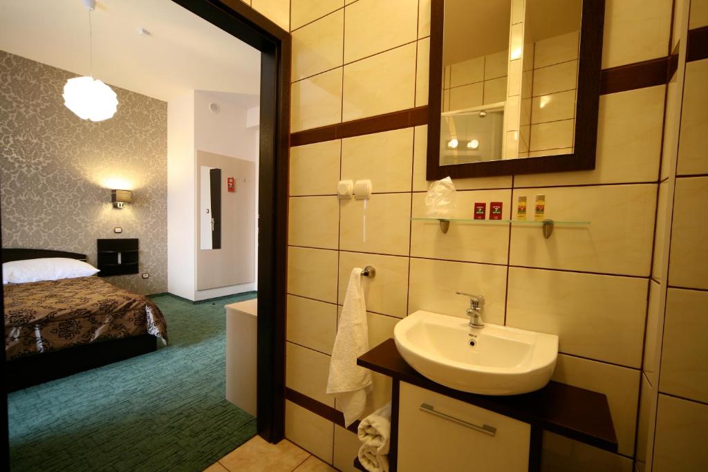 Posteľ alebo postele v izbe v ubytovaní Hotel Seven 7