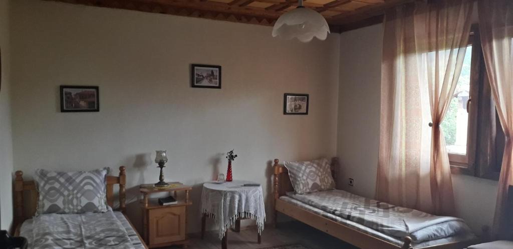 Postel nebo postele na pokoji v ubytování Mechta Guest House