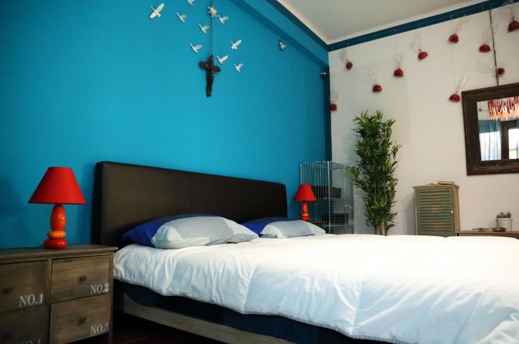 Postel nebo postele na pokoji v ubytování Fabio Room Cercola