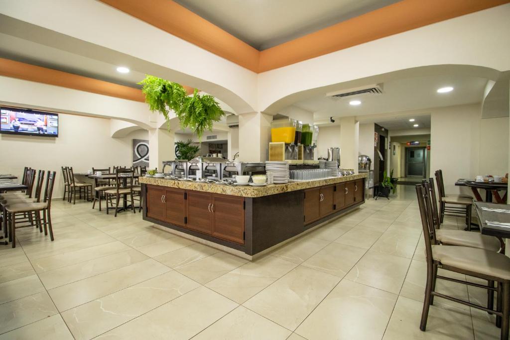 TV a/nebo společenská místnost v ubytování Howard Johnson by Wyndham Veracruz
