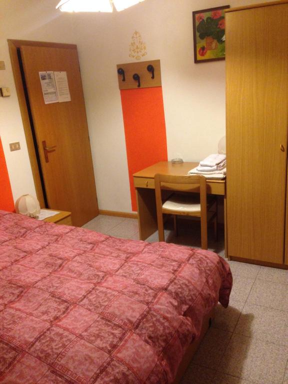 Postel nebo postele na pokoji v ubytování Agritur Alpino