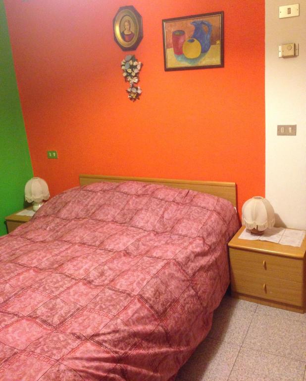 Postel nebo postele na pokoji v ubytování Agritur Alpino