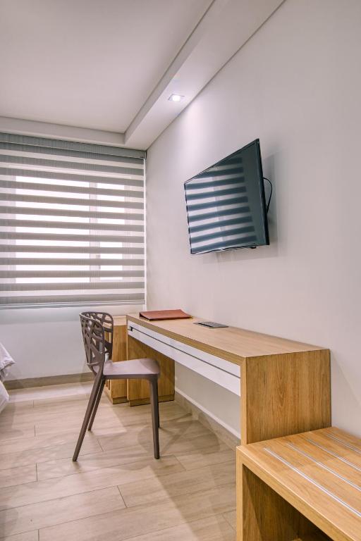 TV a/nebo společenská místnost v ubytování Hotel Dix