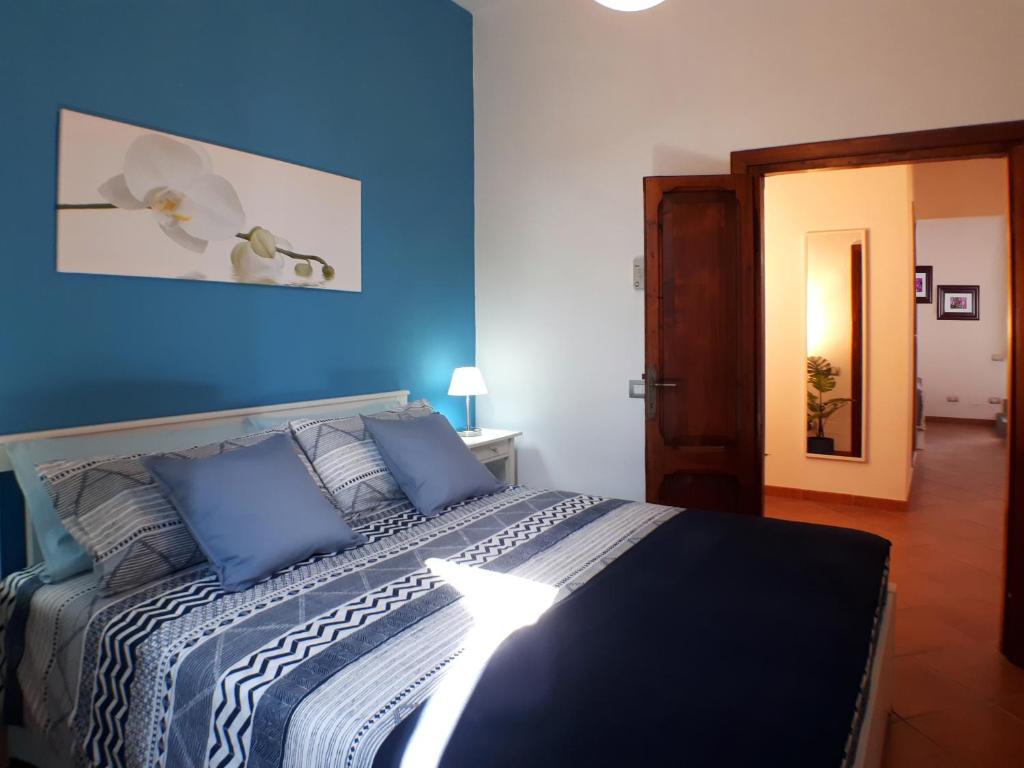 Posteľ alebo postele v izbe v ubytovaní Alloggio turistico La Casa del Vignola