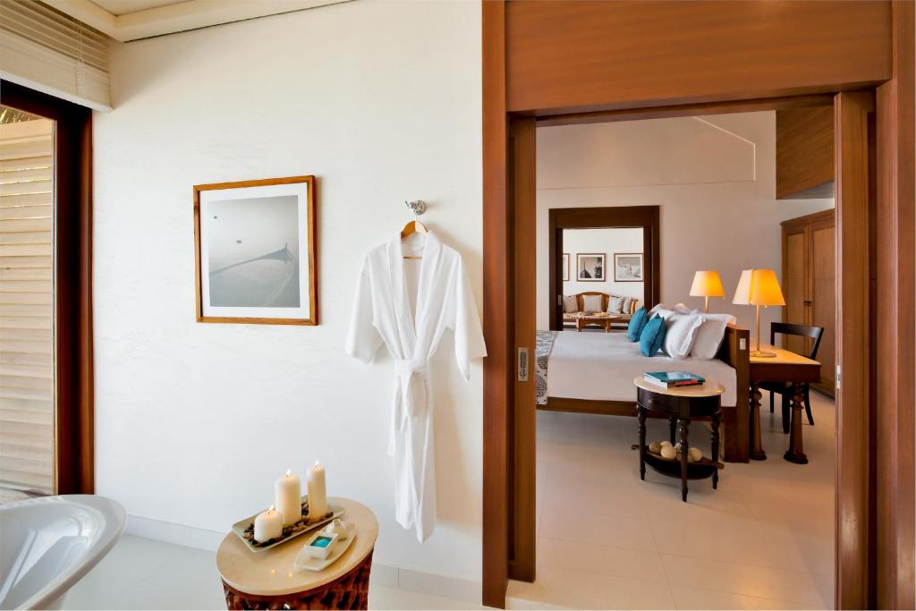 Postel nebo postele na pokoji v ubytování The Residence Maldives