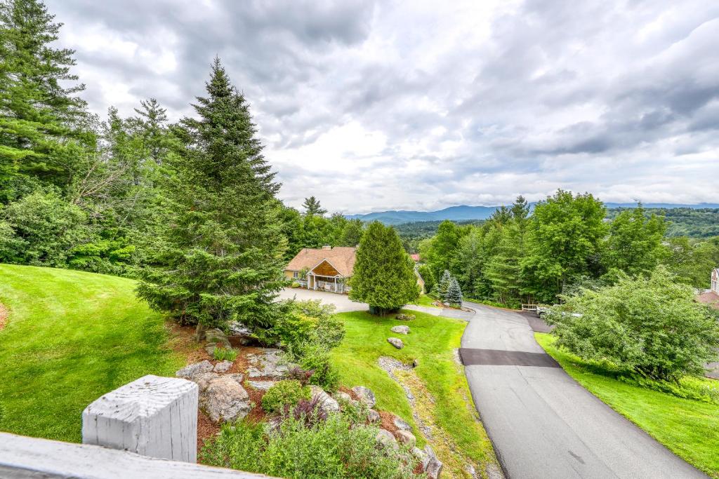 an aerial view of a house with a driveway at Mountain View at Mountainside in Stowe