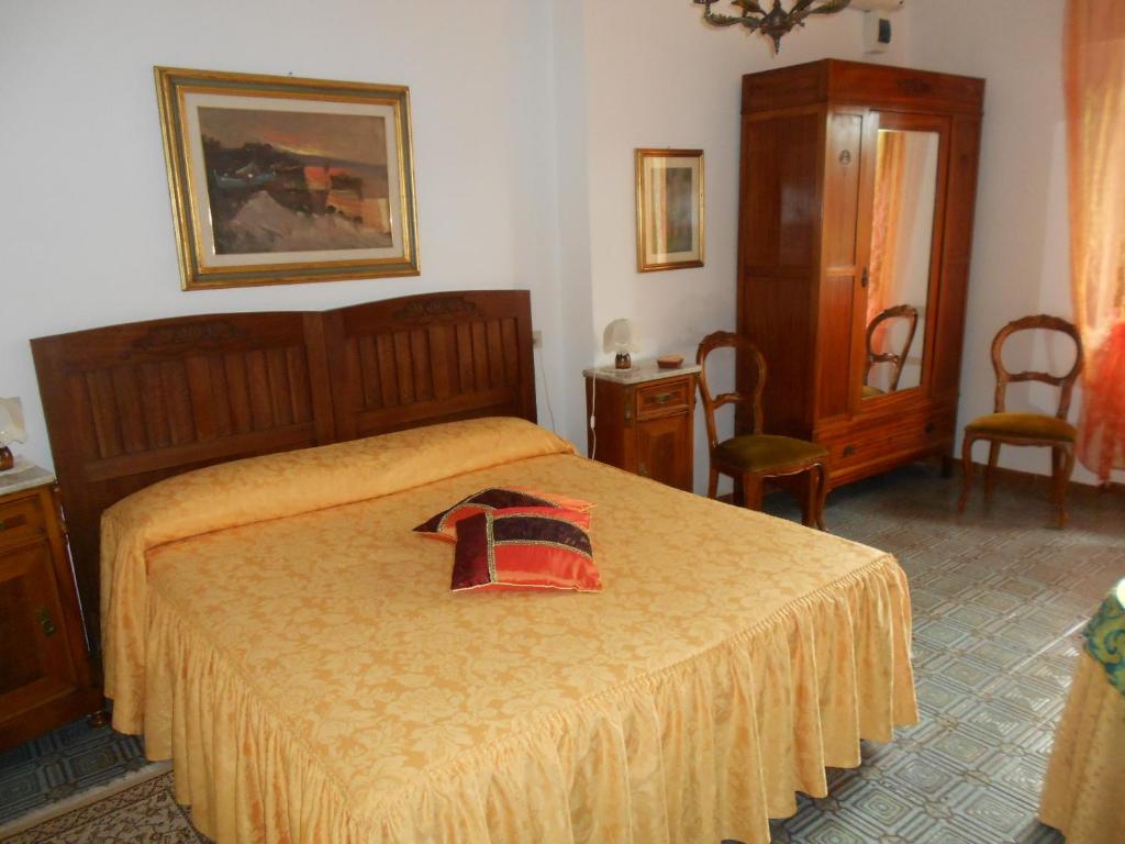 Postel nebo postele na pokoji v ubytování Hotel Rosati