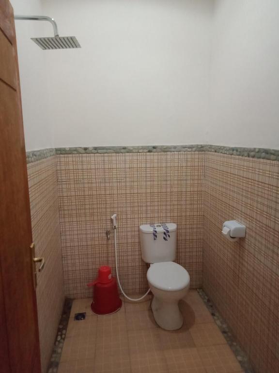 Koupelna v ubytování Riung Guesthouse