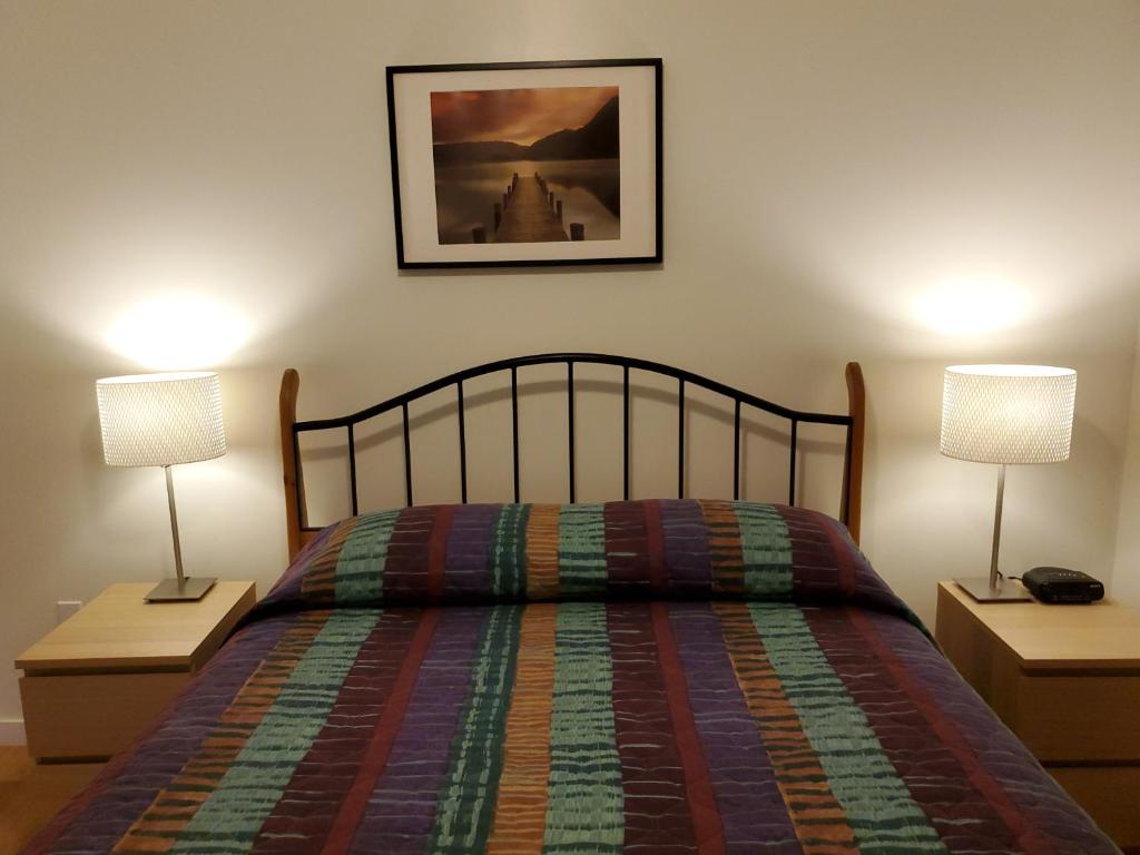 Postel nebo postele na pokoji v ubytování The Hitching Post Motel