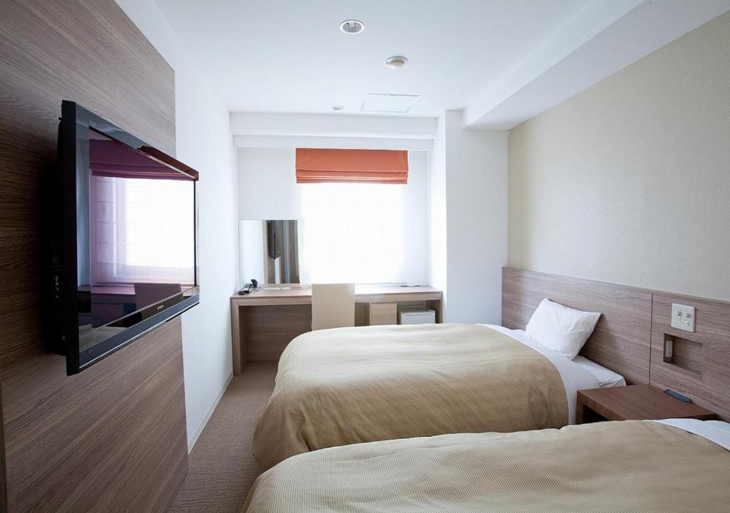 TV a/nebo společenská místnost v ubytování Hotel Sorriso Hamamatsu