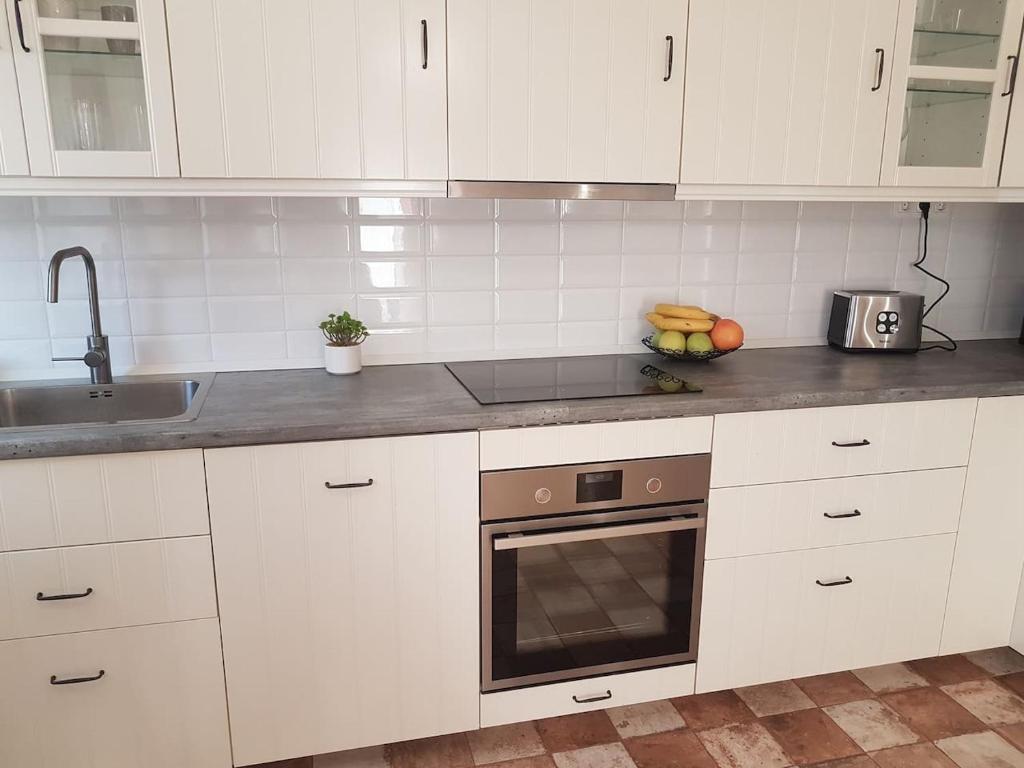 Kuchyňa alebo kuchynka v ubytovaní Központhoz közeli - Cool Tettye Apartman