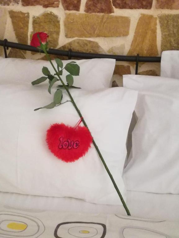 Postel nebo postele na pokoji v ubytování Apartments Zoumperi