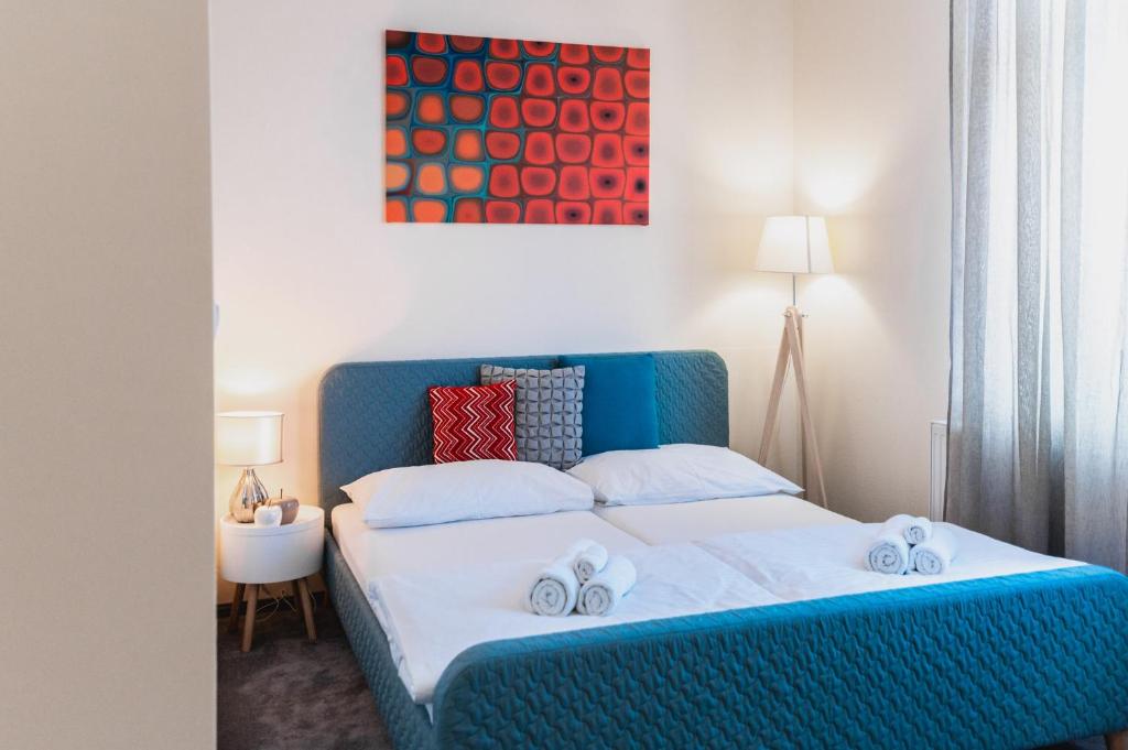 Postel nebo postele na pokoji v ubytování Apartmány na Bašte