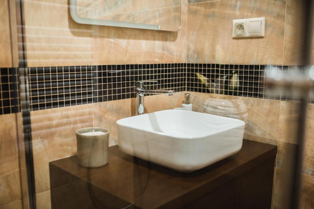 Koupelna v ubytování Apartmány na Bašte