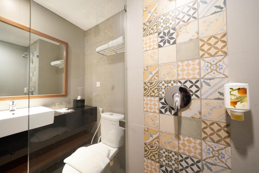 Koupelna v ubytování Kokoon Hotel Surabaya