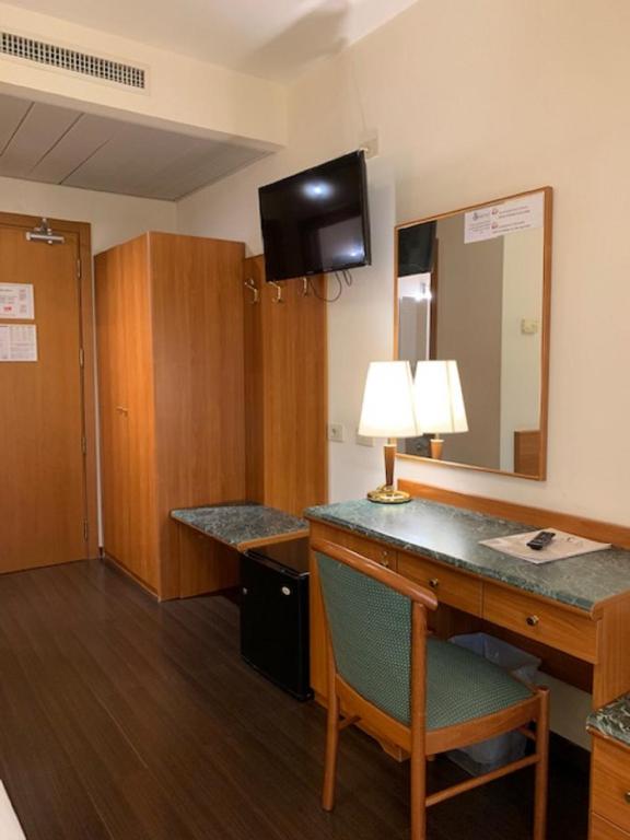 TV a/nebo společenská místnost v ubytování Hotel Sisto V