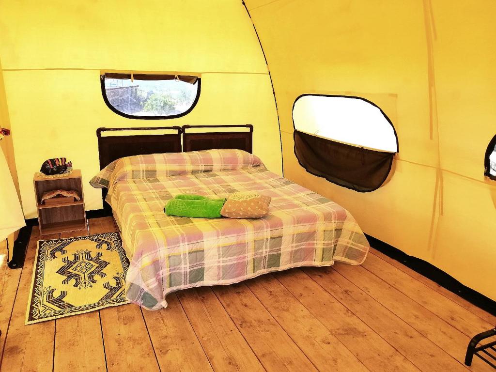 Postel nebo postele na pokoji v ubytování Agriturismo Glamping Erbe Matte