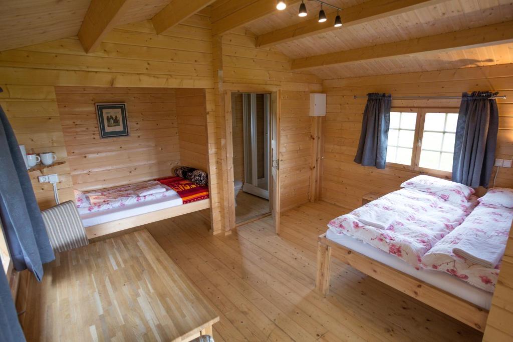 Postel nebo postele na pokoji v ubytování Hunkubakkar Guesthouse