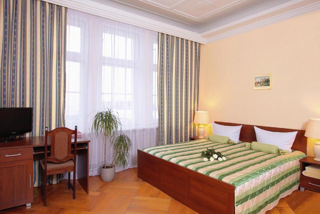 Postel nebo postele na pokoji v ubytování Hotel Central Inn am Hauptbahnhof Pension