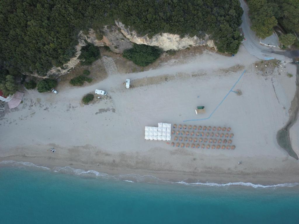 an aerial view of a building on a beach at Riviera Perdika Hotel in Perdika