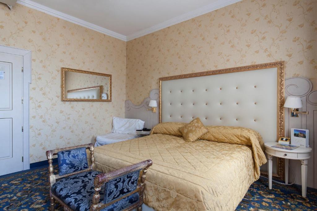 Postel nebo postele na pokoji v ubytování Hotel Riviera Venezia Lido