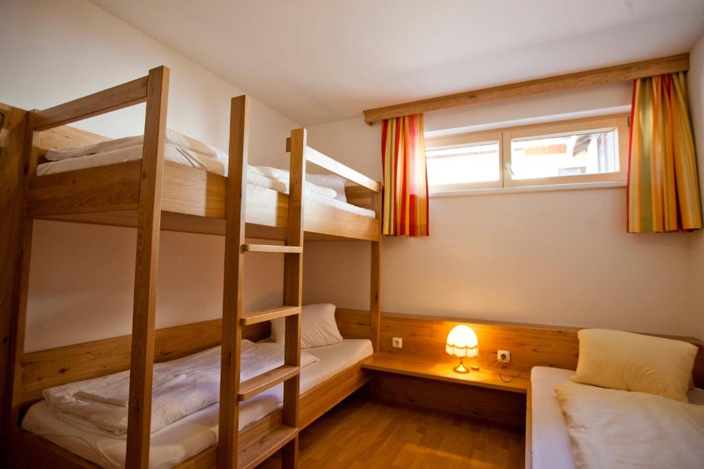 Postel nebo postele na pokoji v ubytování Gasthof Schafferwirt