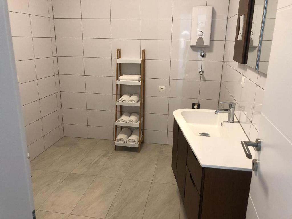 Koupelna v ubytování Elona Apartments