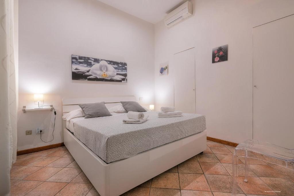 Posteľ alebo postele v izbe v ubytovaní Wine Apartments Florence Moscato