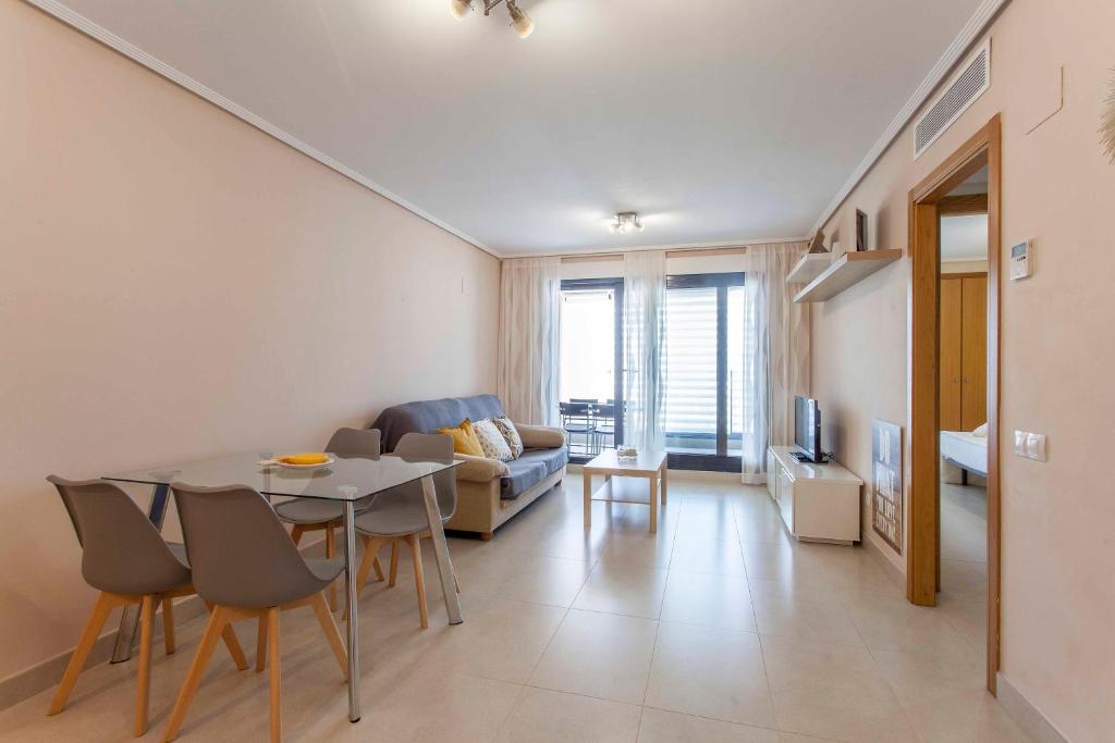A seating area at ApartUP Patacona Palm Beach I