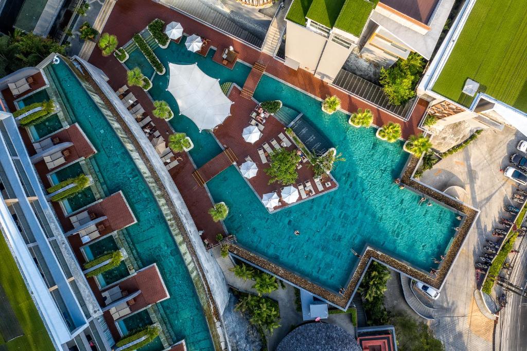 Bazén v ubytování Kalima Resort and Spa nebo v jeho okolí
