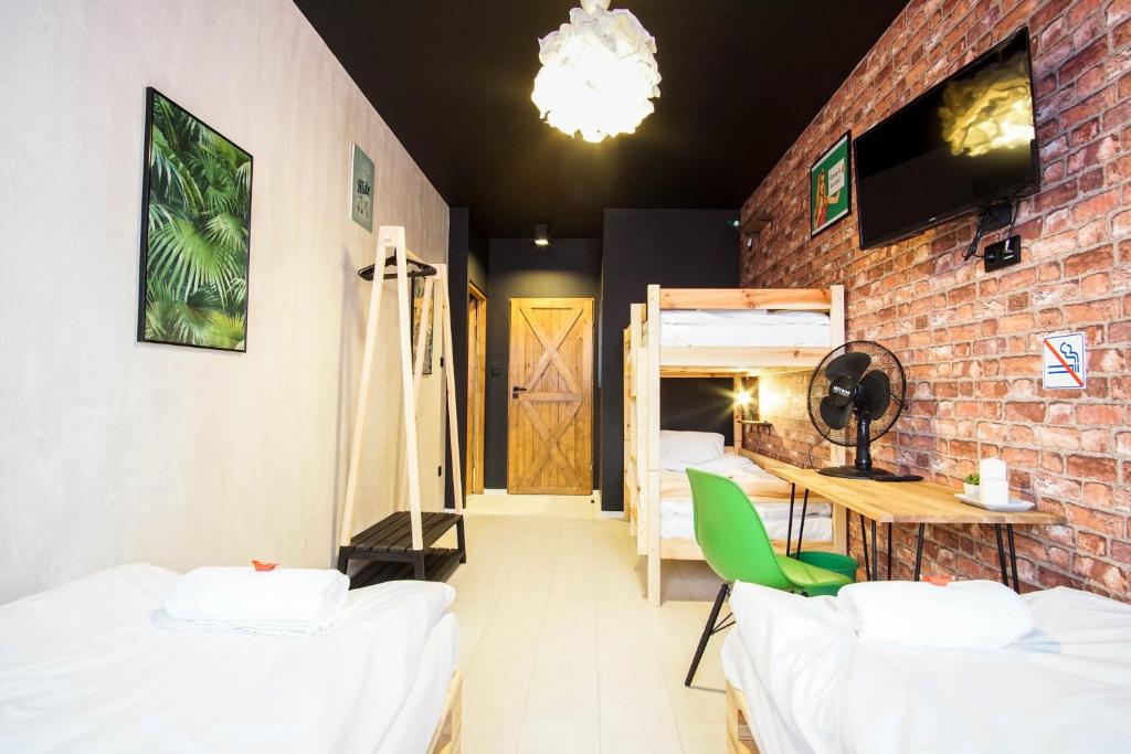 Postel nebo postele na pokoji v ubytování Retro Apartments