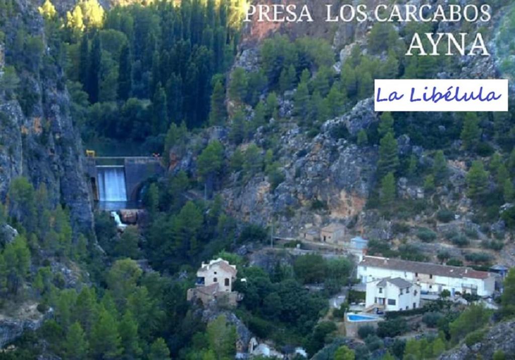 a view of a mountain with a bridge in the distance at Casa rural La Libelula Ayna in Ayna