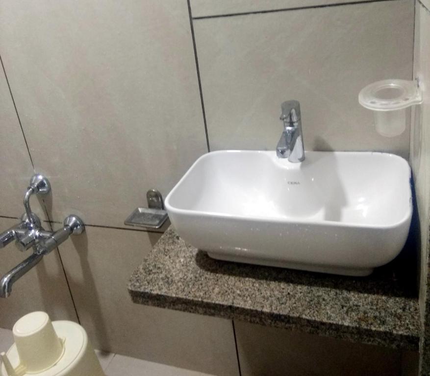 Koupelna v ubytování Hotel Milan