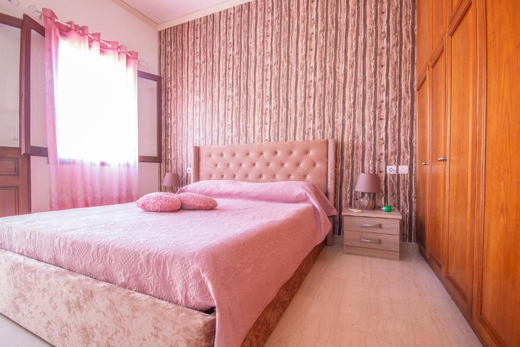 Postel nebo postele na pokoji v ubytování Villa Elion