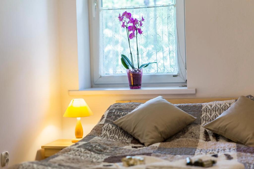 Posteľ alebo postele v izbe v ubytovaní Zakopiański Apartament